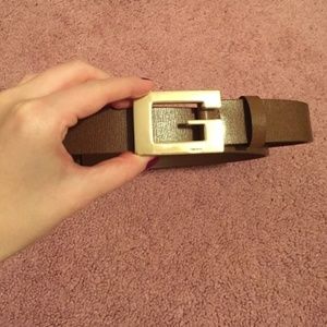 Brown Gucci belt with gold buckle